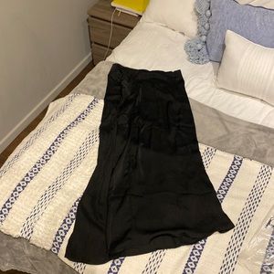 Black mid length skirt with slit up one side
